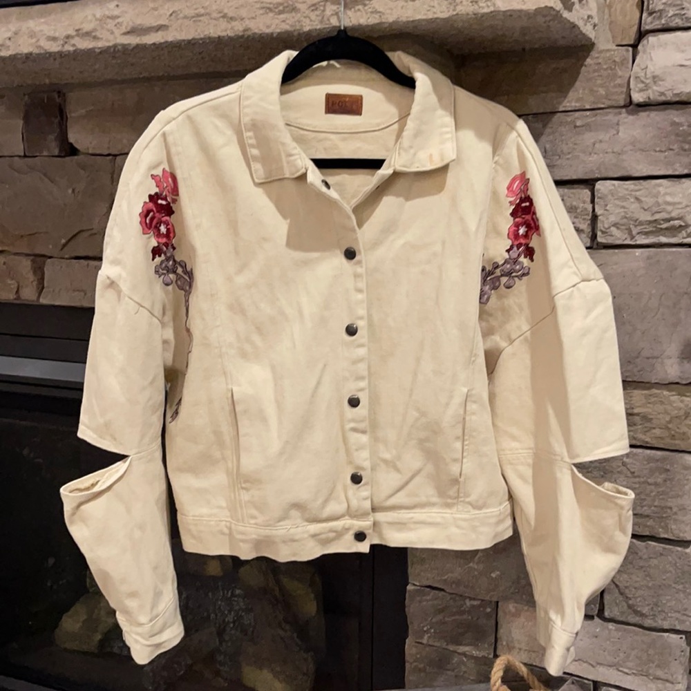 Denim jacket with floral detailing